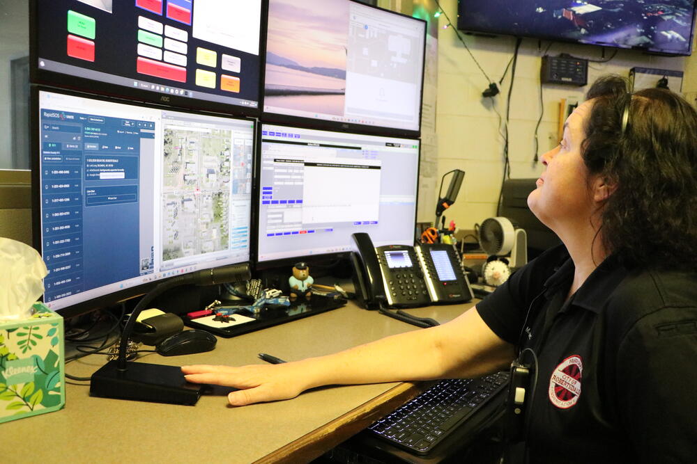Communications officer at dispatch console
