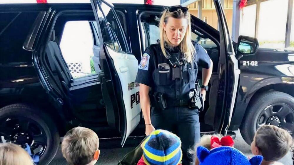 School Resource Officer with students