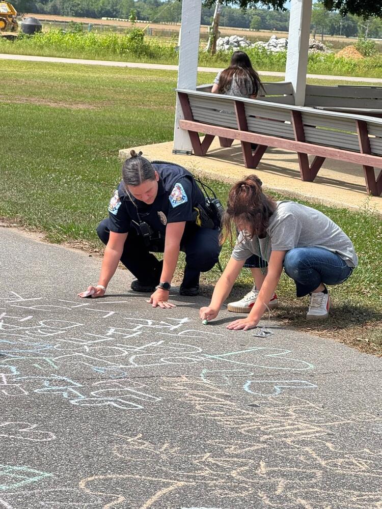 Officer with a student
